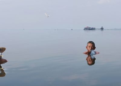 Smoking in the lake (Burma)